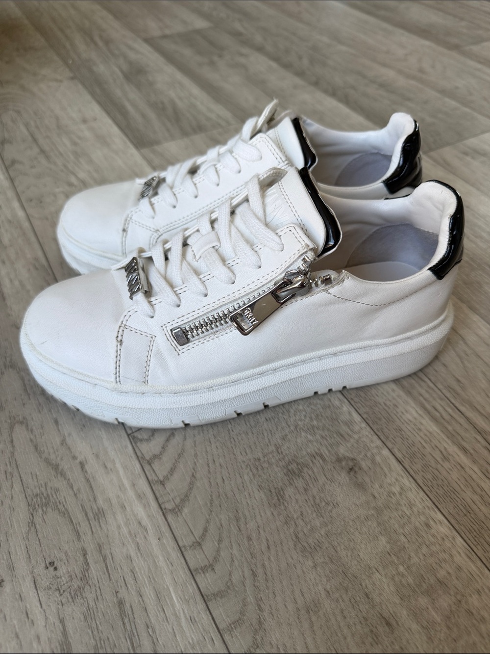 DKNY White vegan leather Lace-Up Sneakers with Silver Hardware